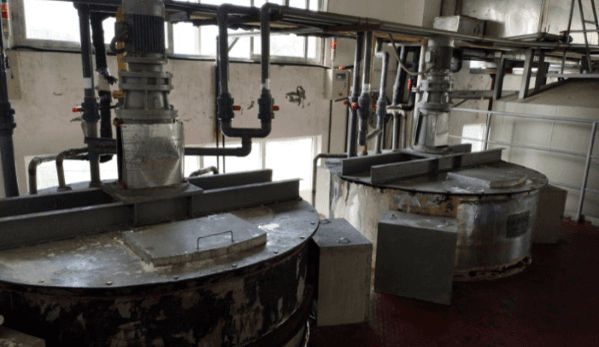 Mechanical processing equipment inside a factory